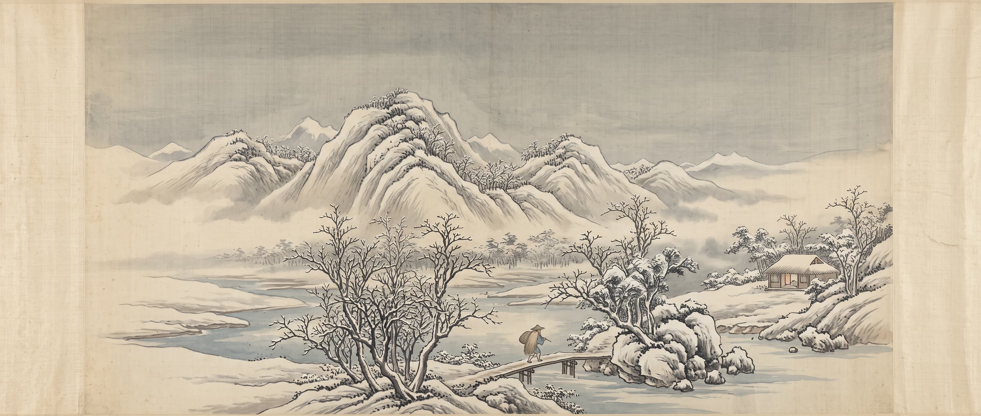 冬景山水:大雪覆盖群山与寒林,河面结冰,一位披着蓑衣的行人走过小木桥,远处小屋透着暖光